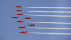 Royal Air Force Red Arrows flying through the sky